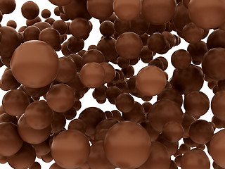 Image showing Large chocolate orbs or bubbles isolated 