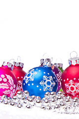 Image showing christmas balls with snowflake symbols