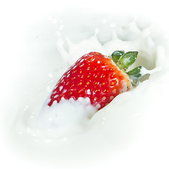 Image showing strawberry splashing into milk