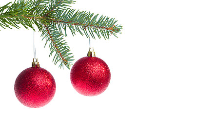 Image showing red christmas ball hanging from tree