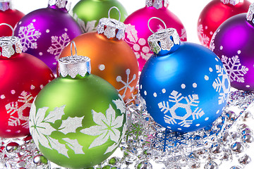 Image showing christmas balls with snowflake symbols