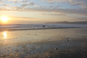 Image showing sunset surfer