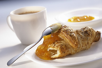 Image showing almonds croissant and apricot jam