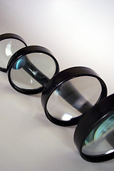 Image showing line of magnifying glasses