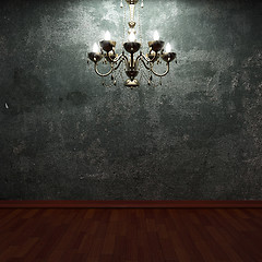 Image showing old concrete wall and chandelier