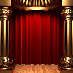 Image showing red velvet curtains behind the gold columns