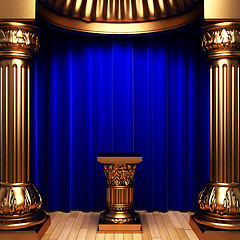 Image showing blue velvet curtains, gold columns and Pedestal