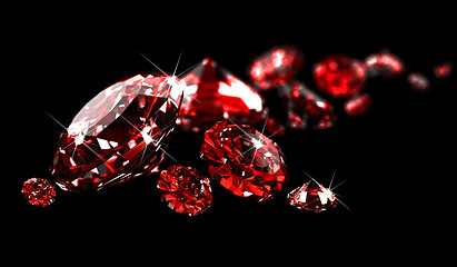 Image showing Rubies on black surface