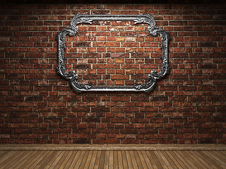 Image showing illuminated brick wall and frame