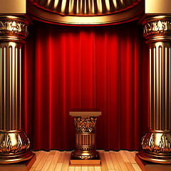 Image showing red velvet curtains, gold columns and Pedestal