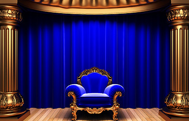 Image showing blue velvet curtains, gold columns and chair