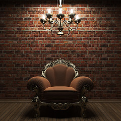 Image showing illuminated brick wall and chair