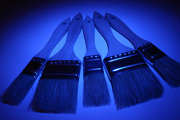 Image showing paint brushes in blue