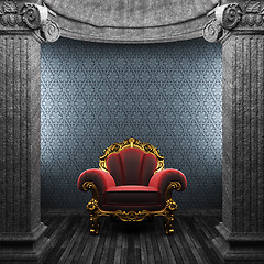 Image showing stone columns, chair and wallpaper