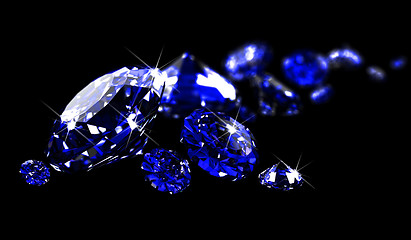 Image showing Sapphires on black surface