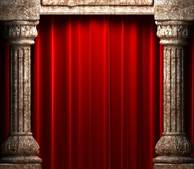 Image showing red velvet curtains behind the stone columns