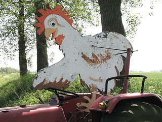 Image showing chicken on tractor