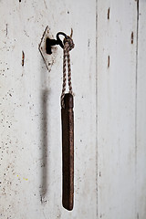 Image showing Old key in old door