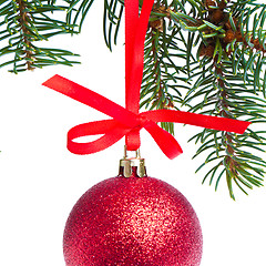 Image showing red christmas ball hanging from tree