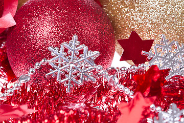 Image showing christmas balls with ribbon and tinsel