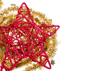 Image showing red christmas star with golden tinsel