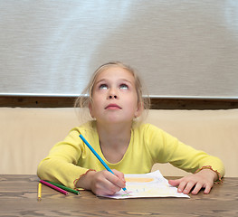 Image showing Girl has thought of drawing.