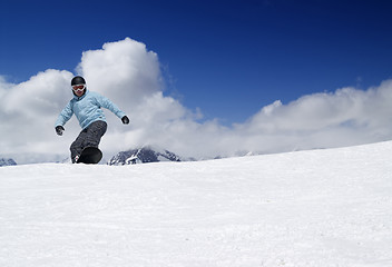 Image showing Snowboarding in high mountains