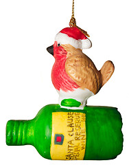 Image showing robin on a bottle isolated over white