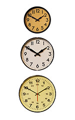Image showing Three vertical clocks