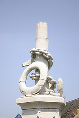 Image showing anchor and lifebouy in stone