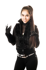 Image showing Portrait of happy young brunette in gloves