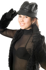 Image showing Portrait of smiling girl in gloves with claws. Isolated