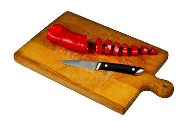 Image showing Sliced Pepper and knife on chopping board