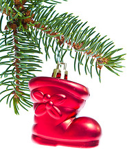 Image showing red christmas star hanging from tree