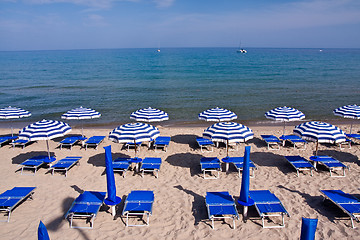 Image showing beach with chairs and umbrellas