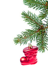 Image showing red christmas star hanging from tree