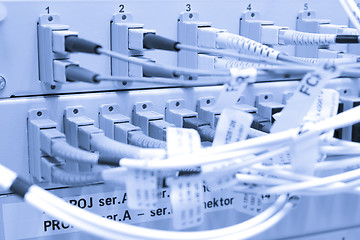 Image showing Fiber cables connected to servers 