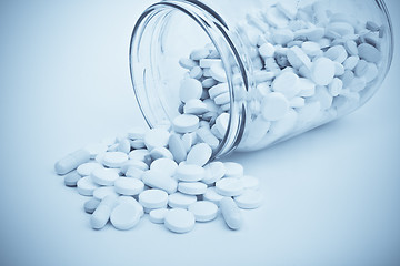 Image showing pills in glass container