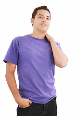 Image showing Handsome teenager boy, casual dressed. Studio shot, white backgr