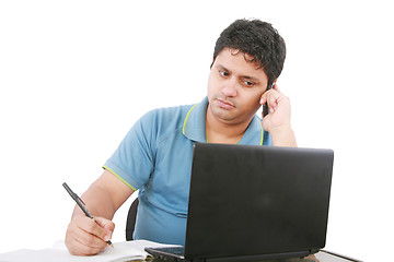 Image showing Man with cellphone and laptop, isolated on white