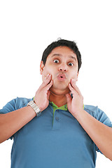 Image showing Portrait of young surprised man gesturing. Isolated on white. 