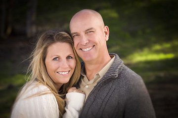 Image showing Attractive Couple Wearing Sweaters in Park