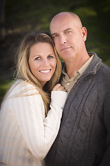 Image showing Attractive Couple Wearing Sweaters in Park