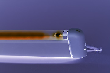 Image showing Fluorescent lamp shining on smooth studio ground