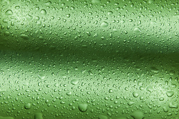 Image showing Drops on green wavy background making texture