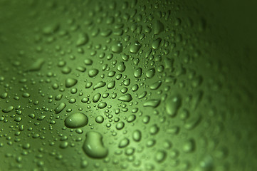 Image showing Drops on green wavy background making texture
