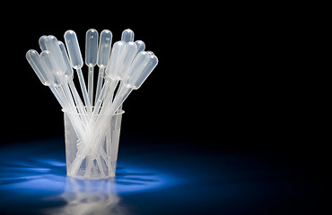 Image showing Pipettes standing in glass in studio