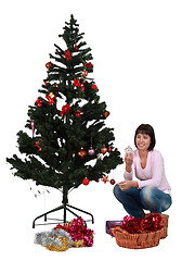 Image showing Decorating the Christmas tree