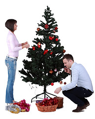 Image showing Decorating the Christmas tree