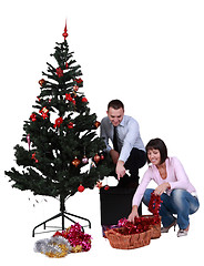 Image showing Decorating the Christmas tree